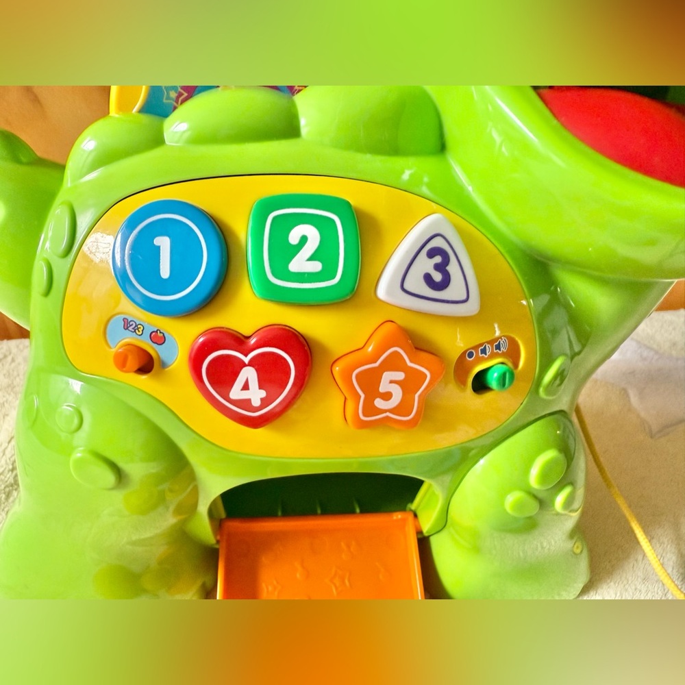 VTech Baby Feed Me Dino Musical Baby Toy with Numbers Counting Music & Shapes - Picture 4 of 10